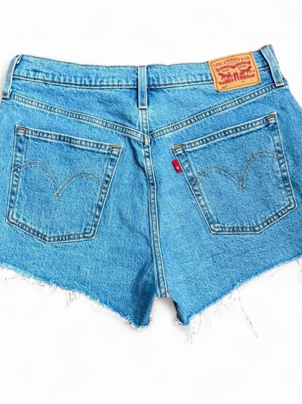 Levi’s 501 blue raw hem jean shorts